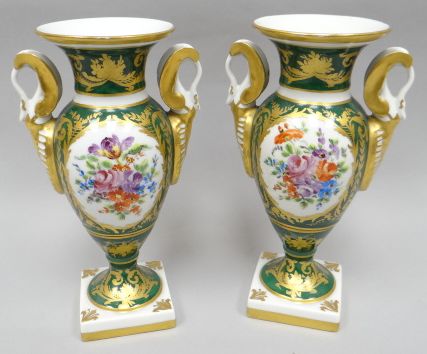 A pair of square based Limoges campana-shape vases with twin handles in green glaze with gilt