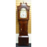 A Victorian cross-banded mahogany eight-day longcase clock having a painted arched dial, inscribed
