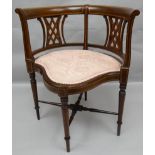 A fine quality inlaid mahogany Edwardian bedroom chair with shaped upholstered seat, curved rail and
