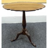 A tilt-top mahogany tripod-table with shaped and galleried top on fluted taper column support