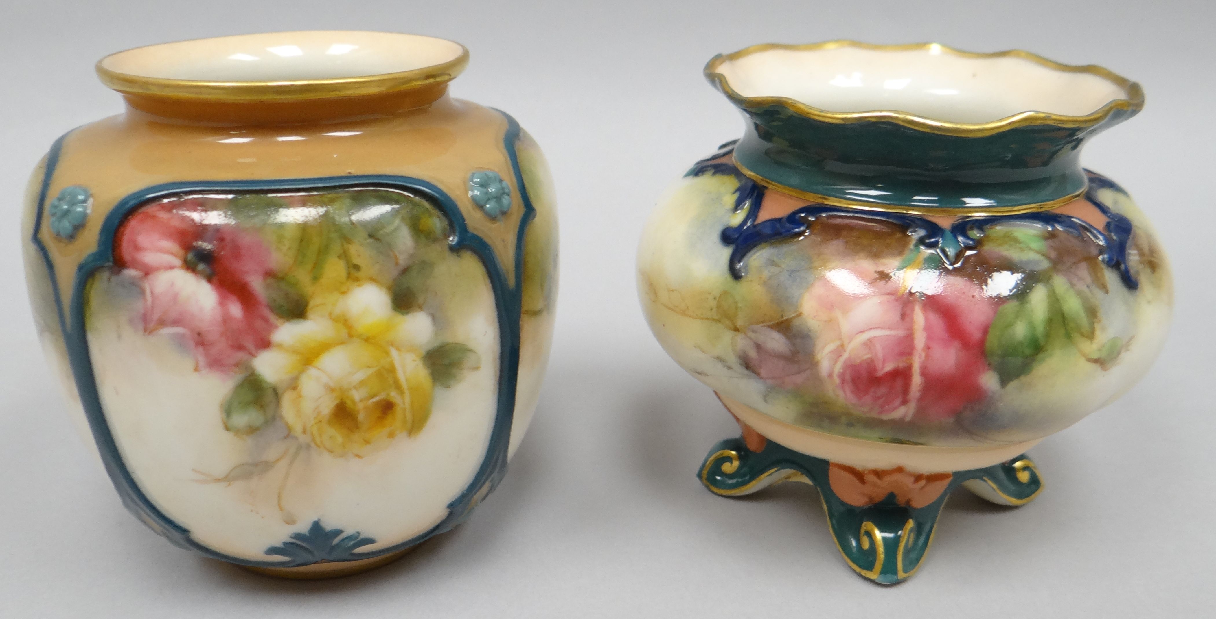 A Royal Worcester 'Hadley Ware' ovoid four-footed vase painted with roses, 3 ins high (7.5 cms);