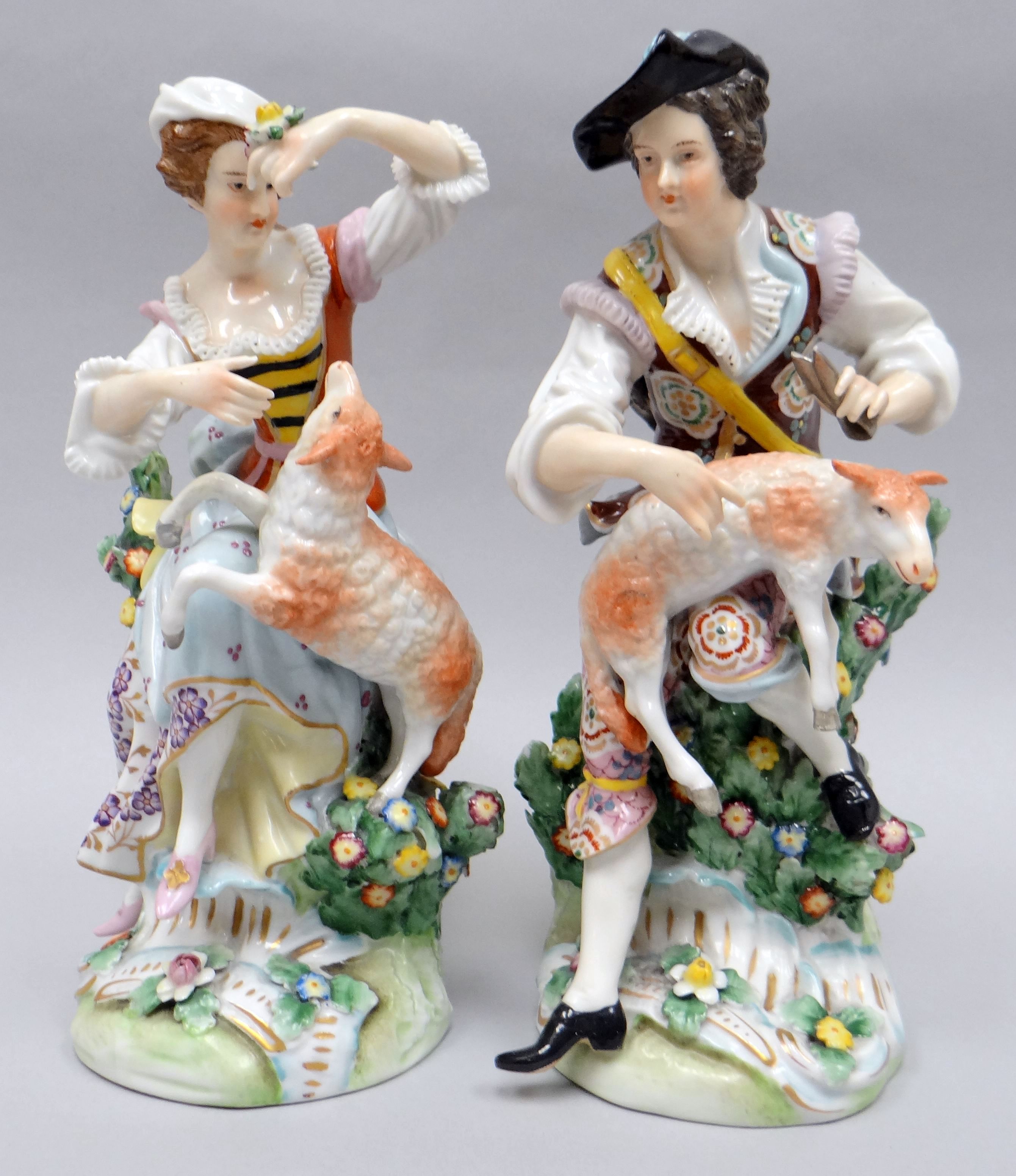 A pair of Derby porcelain figures, modelled as a shepherd and his companion, the shepherd holding