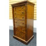 A fine mid-Victorian burr-walnut secretaire Wellington-chest having six graduated drawers, two of