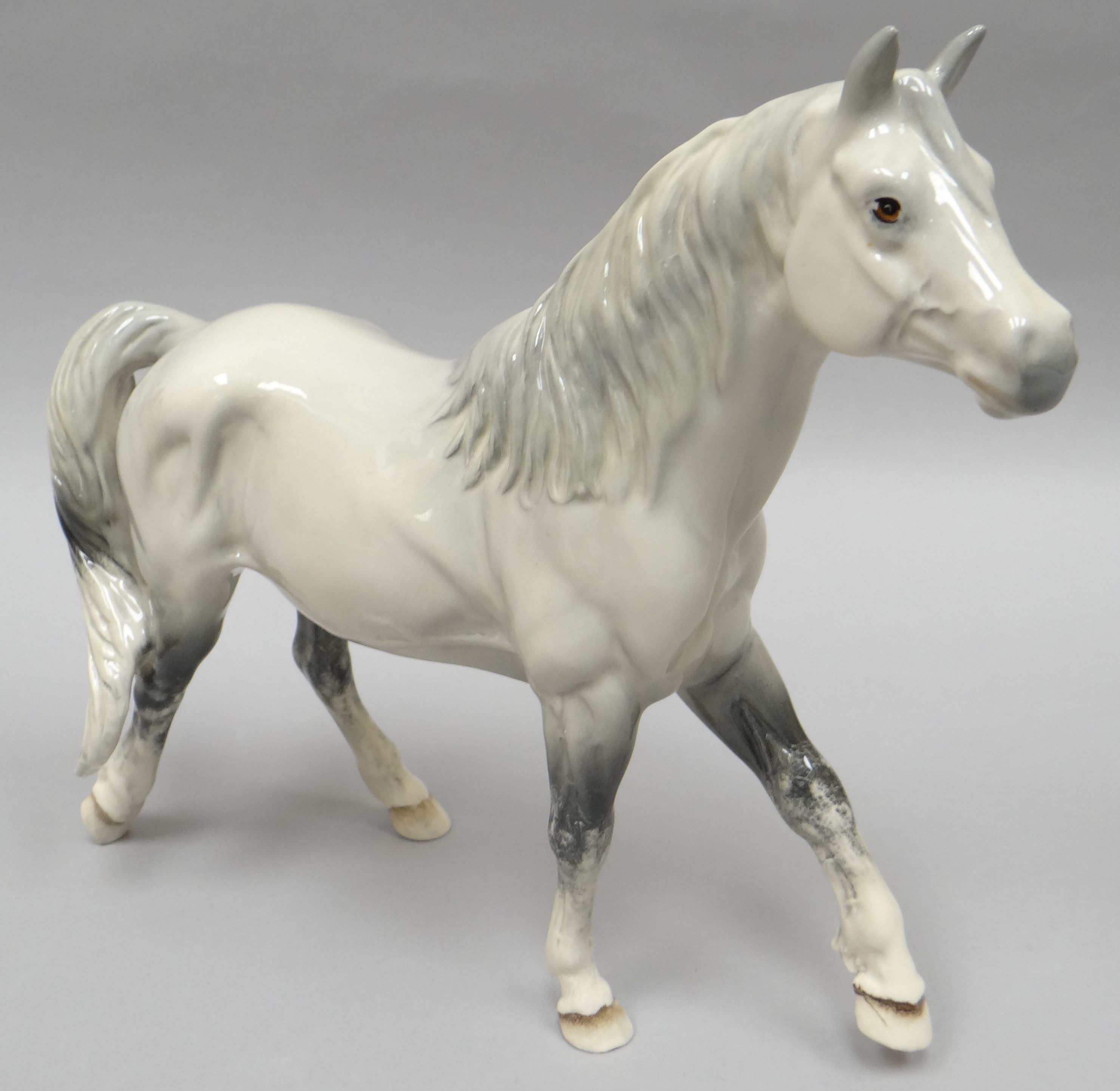 A Royal Doulton standing sculpture of a grey and dappled 'Welsh Mountain Pony'