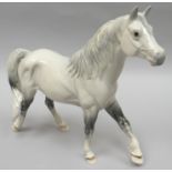 A Royal Doulton standing sculpture of a grey and dappled 'Welsh Mountain Pony'