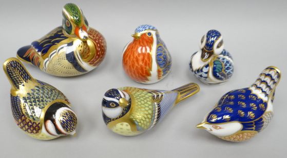 A collection of six Royal Crown Derby Imari decorated bird paperweights including 'Carolina Duck'