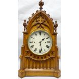 An impressive mid-nineteenth century eight-day Gothic Revival oak 'cathedral' clock of architectural