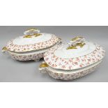 A pair of Royal Worcester footed soup-tureens of shaped oval-form profusely decorated with rust