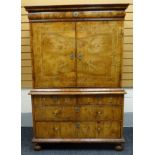A fine quality Queen Anne period walnut cabinet-on-chest having a base of two long and two short