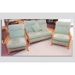 An excellent quality modern Parker Knoll double Bergere teak and green upholstered  three piece