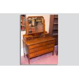 An Edwardian mahogany and line inlaid mirrored dressing chest, 57 x 42 ins (145 x 106.5 cms)