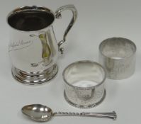 A silver Christening mug of baluster form and with scroll handle, inscribed, Birmingham 1936, 3.
