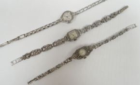 Three marcasite and white metal ladies cocktail wristwatches
