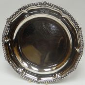 A George III silver shallow dish of shaped circular form, with gadrooned and acanthus border,