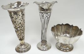 A circular-footed silver bowl of fluted form and with wavy rim, Birmingham 1907, 3.3ozs; together