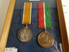 A pair of WWI medals to W George, comprising Mercantile Marine medal and 1914-1918, both with