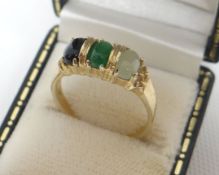 A 9ct yellow gold mineral-trio ring, 2.6gms