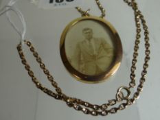 A 9ct yellow gold rolo-chain necklace, 7gms, attached to a 9ct oval photo-locket