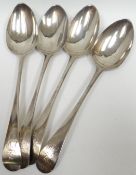 A set of four William IV silver table spoons with crested and monogrammed handles, London 1831, 8.