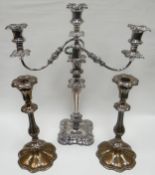 An elaborate three branch EPNS candelabra together with a pair of EPNS candlestick holders (silver