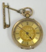 A finely chased 14k yellow gold ladies fob watch, the dial bearing Roman numerals and floral centre,