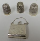 A bright-cut Sterling silver stamp-case in the form of a miniature handbag; together with three