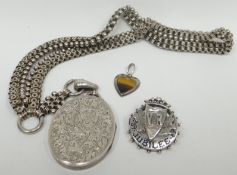 A parcel of three silver items of jewellery including an 1887 Queen Victoria jubilee enamelled