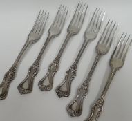 A set of six fiddle-shaped tea-forks with elaborate handles, London 1843, 12.5ozs