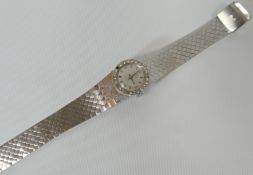 A part white-gold Omega ladies cocktail-watch, dial and clasp marked 18k 0.750, having a