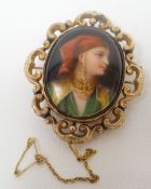 A Victorian locket swivelling within, a believed 9ct, scrolling mount, the obverse having a finely
