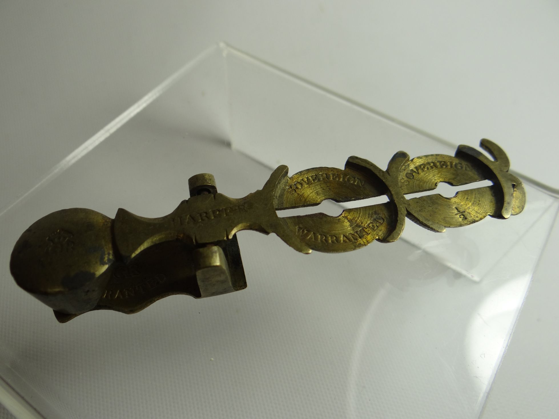 A set of Georgian brass sovereign pocket-scales by Harper