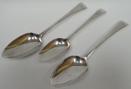 A silver table spoon with engraved decoration to the handle and stem, monogrammed 'JH', inscribed