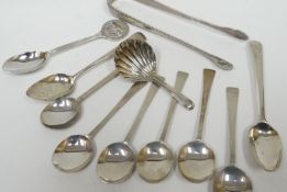 A parcel of silver flatware including George II sugar tongs, London by George Burrows, 1oz; together