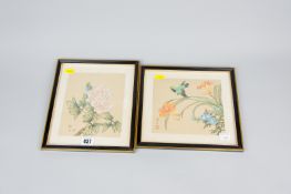 A pair of framed Japanese hand painted cloth panels, one depicting a bird among flowers, the other a