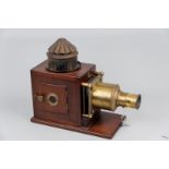 A Victorian mahogany and brass Magic Lantern (later converted for electricity) of traditional design