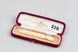 An early 20th Century hand carved ivory or bone bookmarker