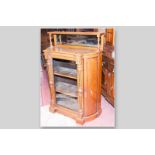 A good quality late Victorian oak side cabinet, small mirrored back top with single shelf