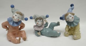 A trio of Nao harlequin clowns