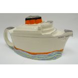 A rare painted and lustre novelty teapot in the form of RMS Queen Mary, the lid being the three
