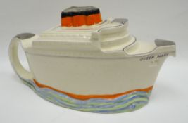 A rare painted and lustre novelty teapot in the form of RMS Queen Mary, the lid being the three