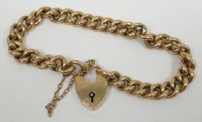 A 9ct yellow gold cable-link bracelet and heart shaped padlock, 14.27gms