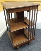 An Edwardian mahogany revolving bookcase (for re-polishing)