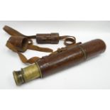 A leather encased four-draw signal telescope (TEL. SIG. MK VI) with maker's name BC Ltd & Co,