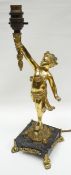 A marble-based gilt-metal torch-bearer cherub table lamp for electric use, on four gilded corner
