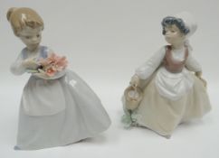 Two Nao girl figures being a flower picker and a water carrier
