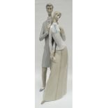A Lladro model of a standing couple in a sensual pose, 15.5ins high (39cms)