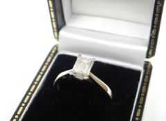 A 950 platinum ring set with solitaire baguette diamond, visual estimate 0.7ct