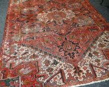 A Persian Heriz rug, 79 x 111ins (200 x 282cms)