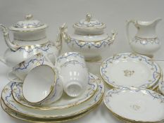 A late nineteenth century Coalport forty-two piece tea-service, decorated in a blue and gilt design