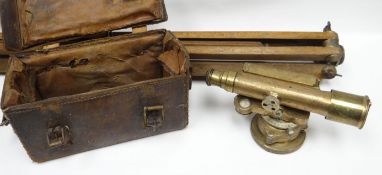 A vintage brass builder's level by E R WATTS & SONS, London No.12829, accompanied by wooden tripod